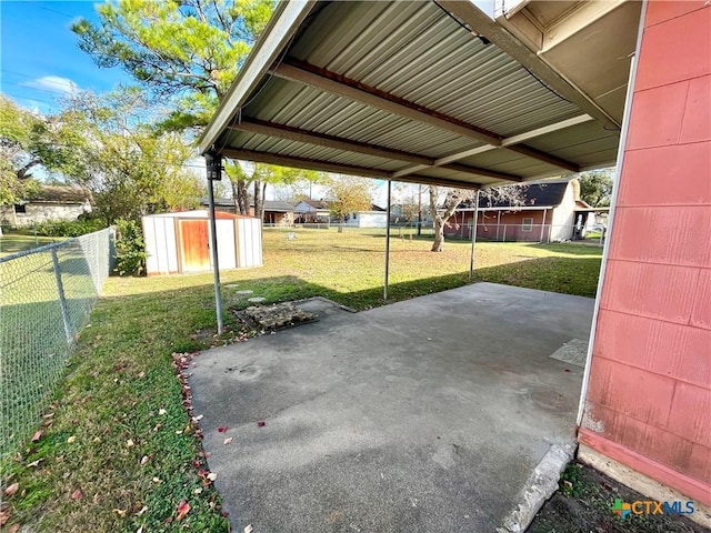 view of patio / terrace featuring a storage unit