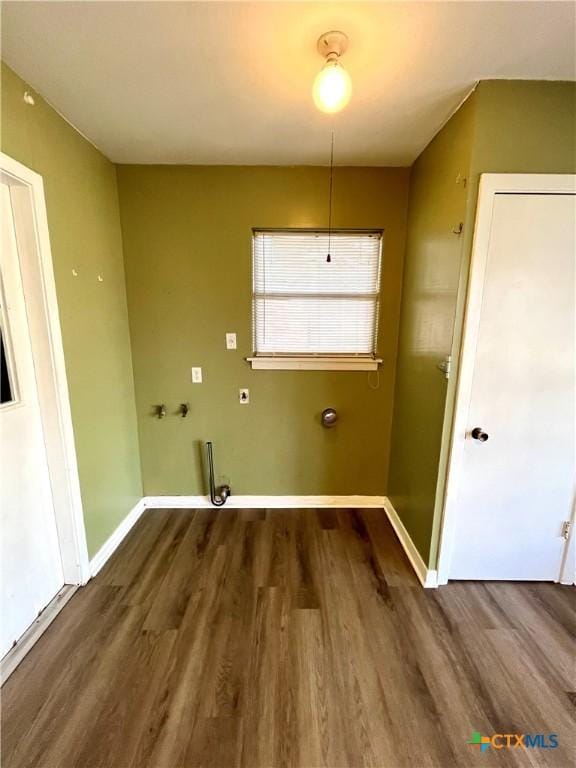 laundry room featuring washer hookup, electric dryer hookup, and dark wood-type flooring