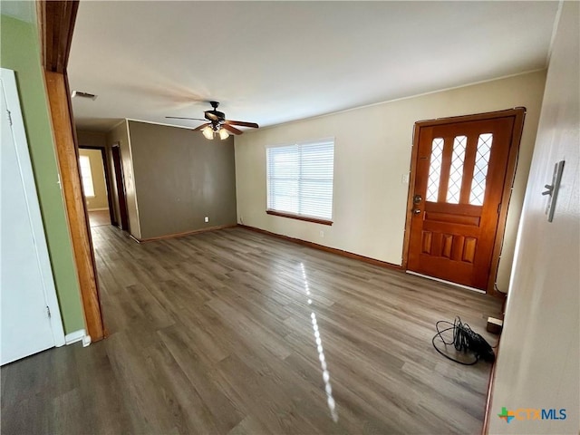 foyer entrance featuring ceiling fan and hardwood / wood-style flooring