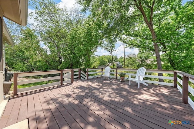 4130 Cripple Creek Dr, Temple, TX 76502 - wooden deck featuring view of wooded area