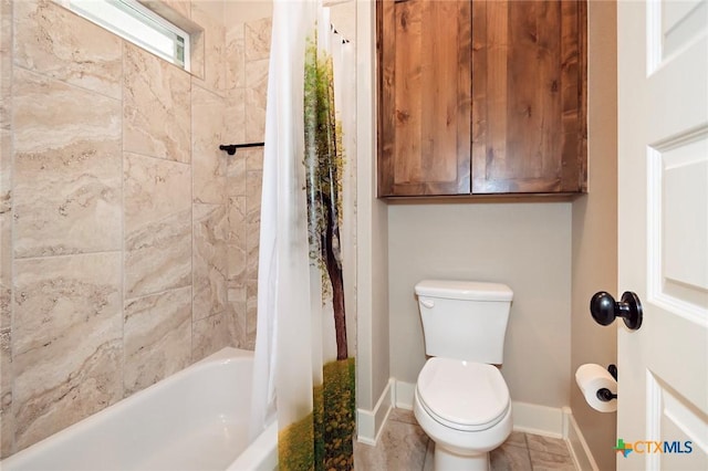 bathroom featuring toilet and shower / bath combo