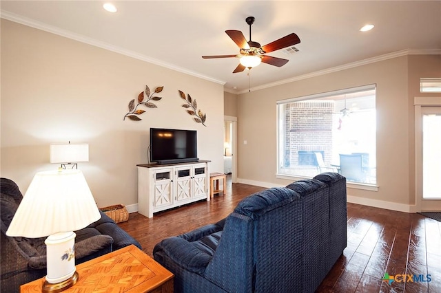 living room with crown molding, dark wood-type flooring, and ceiling fan