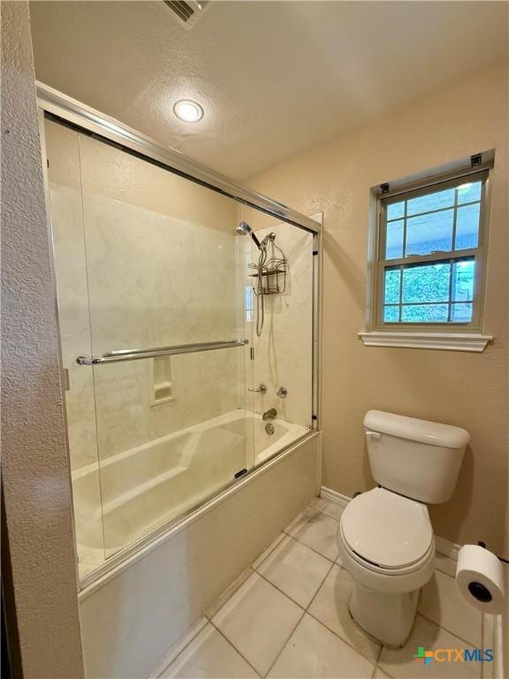 3002 Lois Cir, Copperas Cove, TX 76522 - bathroom featuring enclosed tub / shower combo, tile patterned floors, and recessed lighting