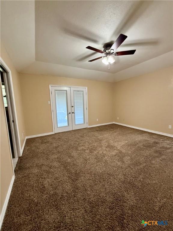 3002 Lois Cir, Copperas Cove, TX 76522 - unfurnished room with french doors, ceiling fan, and carpet floors