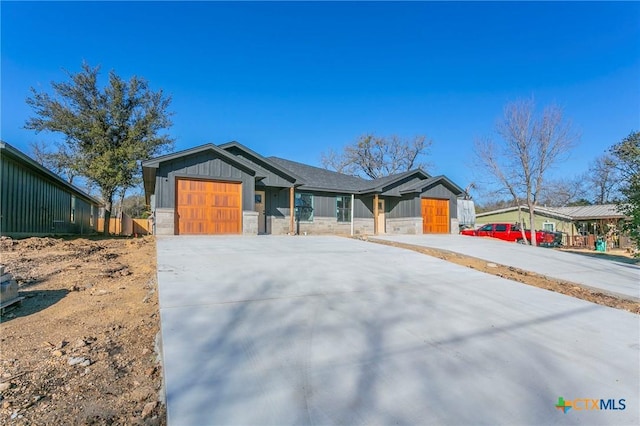 view of front of property with a garage