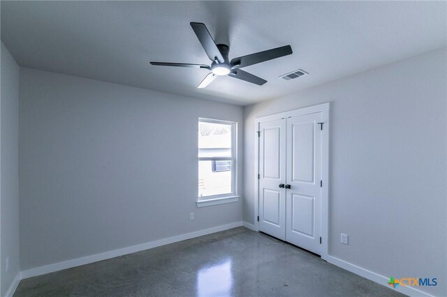 empty room featuring concrete floors