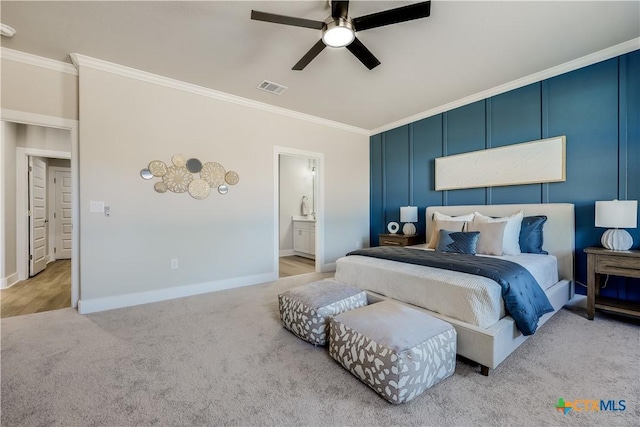 bedroom featuring light carpet, baseboards, visible vents, a ceiling fan, and ornamental molding