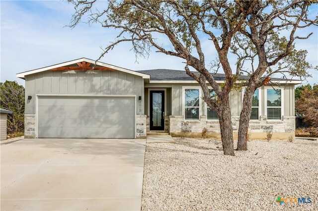 ranch-style home with a garage