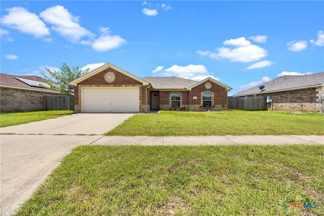 1212 Trailboss Dr, Killeen, TX 76549 - ranch-style home featuring driveway, an attached garage, and brick siding