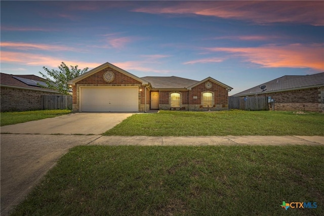 1212 Trailboss Dr, Killeen, TX 76549 - view of front of property with brick siding, driveway, and an attached garage