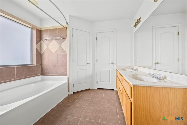 1212 Trailboss Dr, Killeen, TX 76549 - full bath with tile patterned floors, double vanity, and tub / shower combination