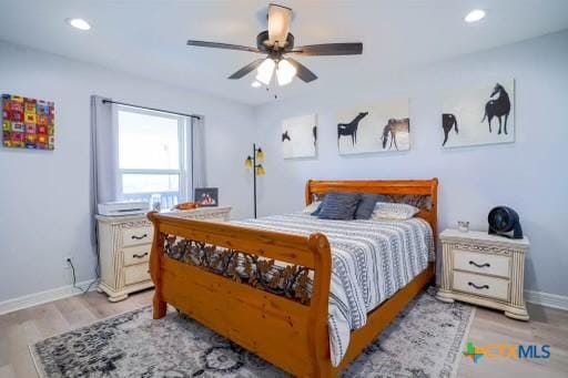 bedroom featuring light wood-type flooring, ceiling fan, baseboards, and recessed lighting