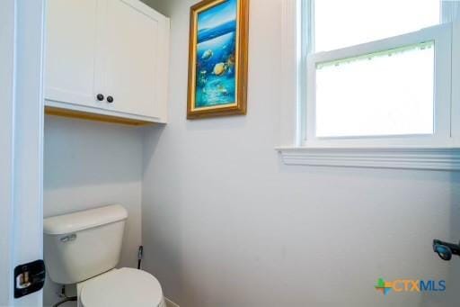 bathroom featuring toilet
