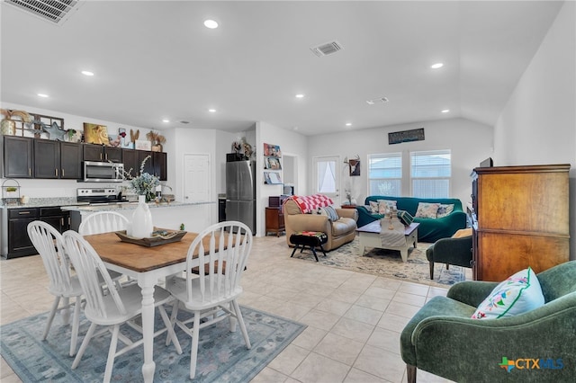 dining area with light tile patterned floors