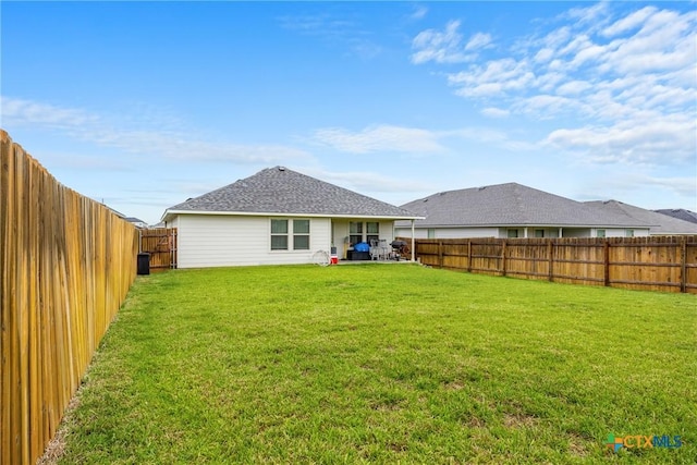 8919 Cantera Ridge Rd, Temple, TX 76502 - back of property with a fenced backyard and roof with shingles