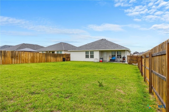 8919 Cantera Ridge Rd, Temple, TX 76502 - rear view of property featuring a fenced backyard and roof with shingles