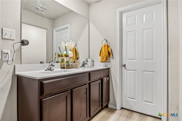 8919 Cantera Ridge Rd, Temple, TX 76502 - full bath featuring double vanity and wood finished floors