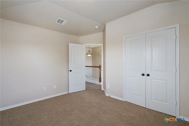 3903 Scenic Trail Dr, Harker Heights, TX 76548 - unfurnished bedroom featuring vaulted ceiling, carpet, baseboards, and a closet
