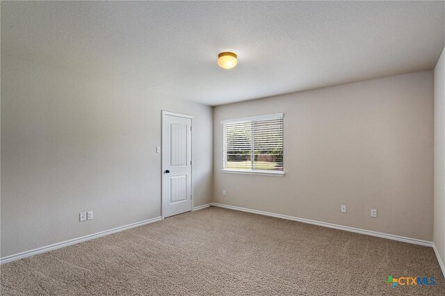 3903 Scenic Trail Dr, Harker Heights, TX 76548 - spare room featuring carpet floors and baseboards