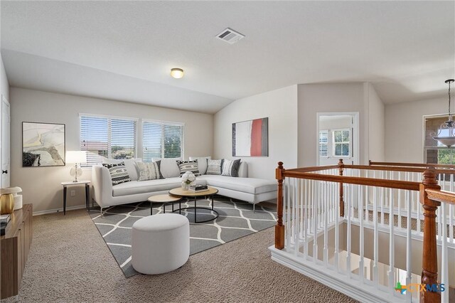 3903 Scenic Trail Dr, Harker Heights, TX 76548 - living area featuring vaulted ceiling, carpet flooring, and baseboards