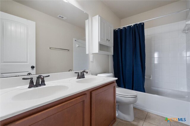 3903 Scenic Trail Dr, Harker Heights, TX 76548 - full bathroom featuring toilet, tile patterned floors, double vanity, and shower / bath combo