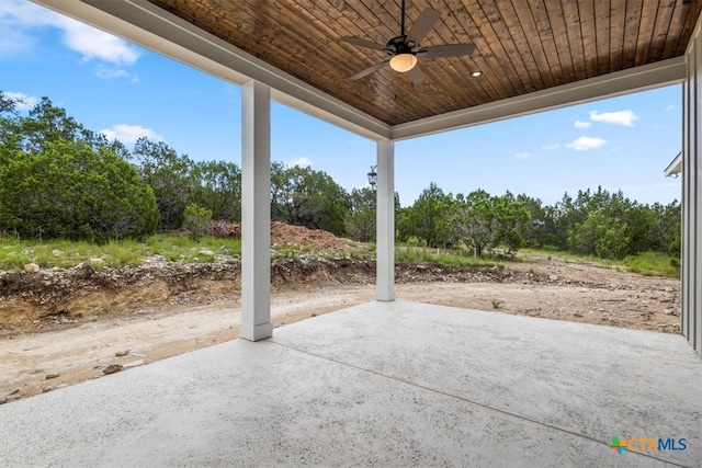 view of patio featuring ceiling fan