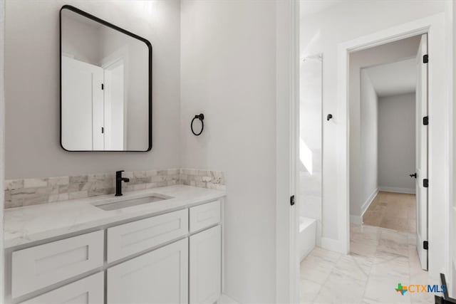 bathroom featuring vanity and shower / bath combination