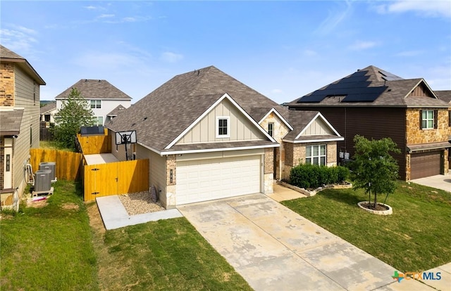 865 Stockdale Rd, Copperas Cove, TX 76522 - craftsman-style house featuring board and batten siding, driveway, stone siding, a shingled roof, and an attached garage