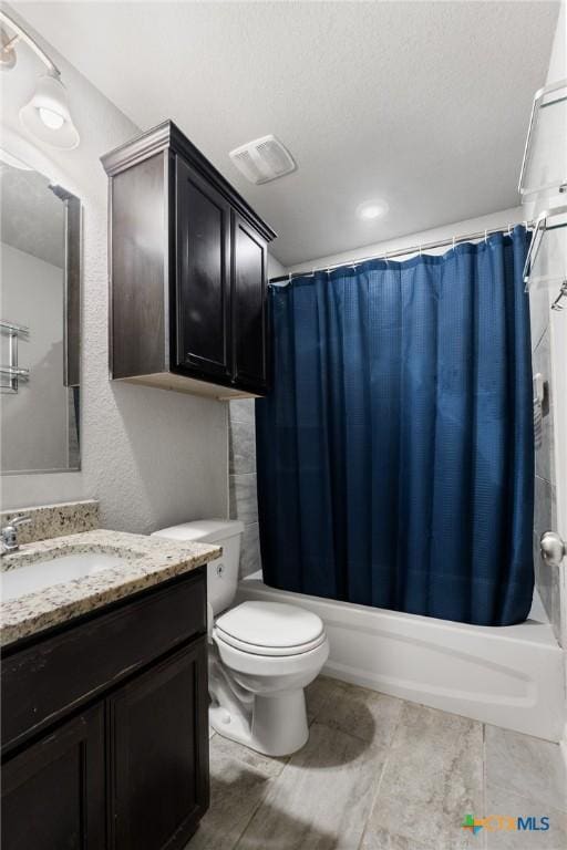 865 Stockdale Rd, Copperas Cove, TX 76522 - bathroom with vanity, shower / bath combo, and a textured ceiling