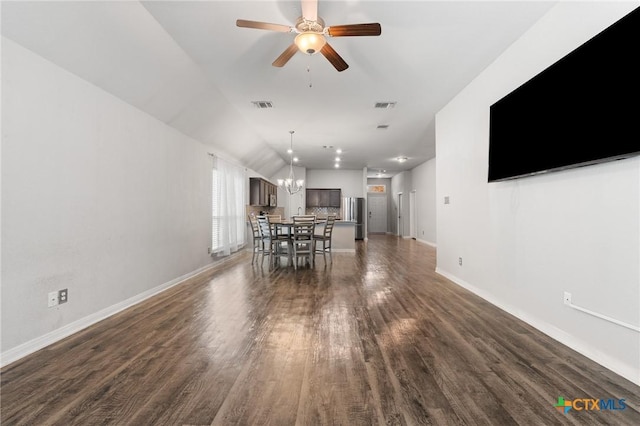 865 Stockdale Rd, Copperas Cove, TX 76522 - living room with dark wood finished floors, a chandelier, and a ceiling fan