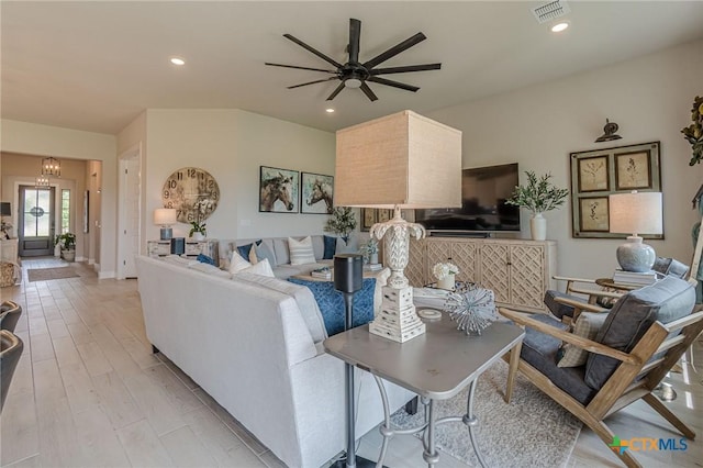 1308 Dancing Oak Ln, San Marcos, TX 78666 - living area featuring ceiling fan and recessed lighting