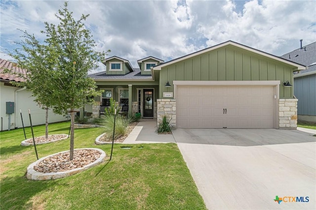 1308 Dancing Oak Ln, San Marcos, TX 78666 - craftsman-style house featuring stone siding, a garage, concrete driveway, and a front lawn