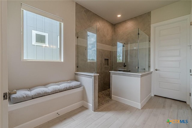 1308 Dancing Oak Ln, San Marcos, TX 78666 - full bath with walk in shower, wood finished floors, and recessed lighting