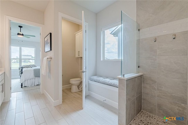 1308 Dancing Oak Ln, San Marcos, TX 78666 - bathroom with ensuite bath, walk in shower, ceiling fan, and healthy amount of natural light