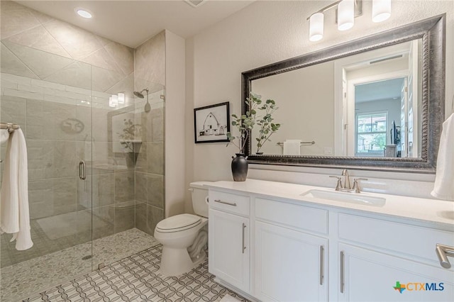 1308 Dancing Oak Ln, San Marcos, TX 78666 - bathroom featuring vanity, a shower stall, and recessed lighting