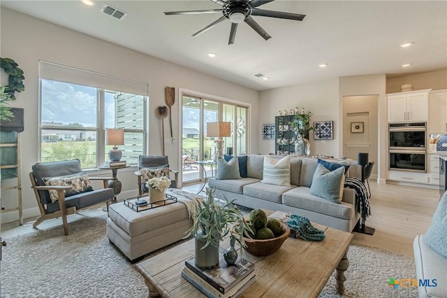 1308 Dancing Oak Ln, San Marcos, TX 78666 - living area with ceiling fan, recessed lighting, and light wood-style floors
