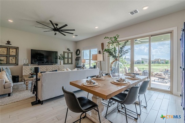 1308 Dancing Oak Ln, San Marcos, TX 78666 - dining space featuring light wood-type flooring, ceiling fan, and recessed lighting