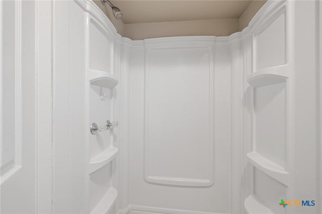 full bathroom featuring walk in shower