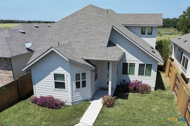 view of front facade with a front lawn