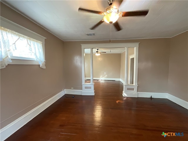 unfurnished room with ceiling fan and dark hardwood / wood-style floors