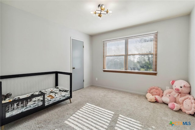 2406 Northwoods Dr, New Braunfels, TX 78132 - bedroom featuring carpet flooring and a chandelier