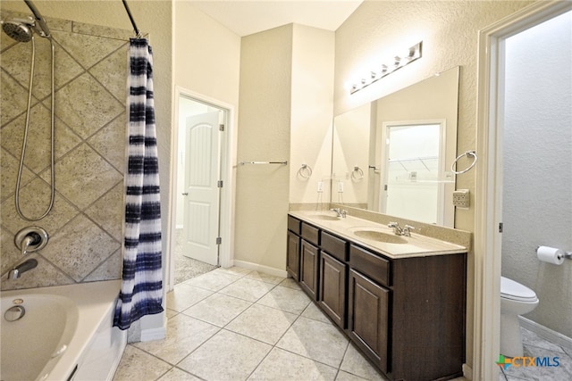 full bathroom featuring tile patterned floors, vanity, shower / bath combo, and toilet