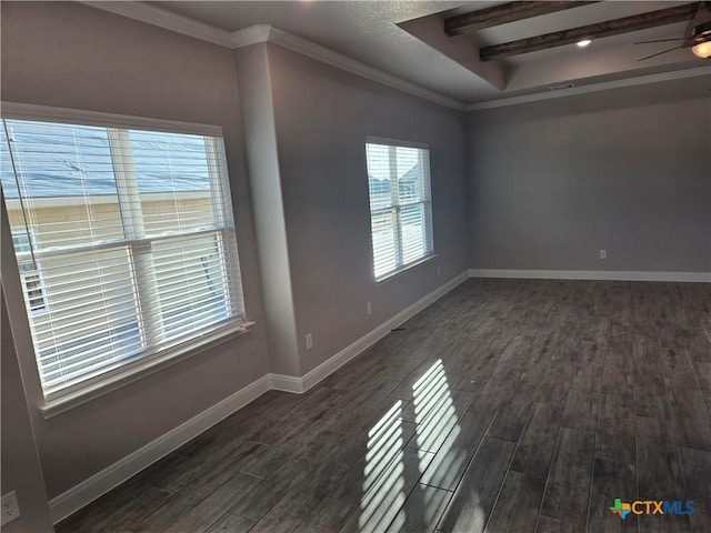 spare room with ceiling fan, dark wood-type flooring, baseboards, beam ceiling, and crown molding