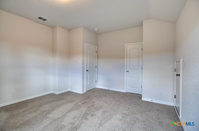 empty room featuring carpet