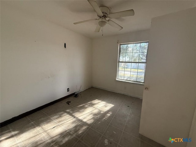 empty room featuring ceiling fan