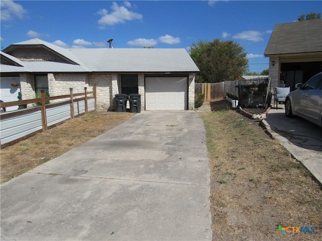 view of side of property featuring a garage