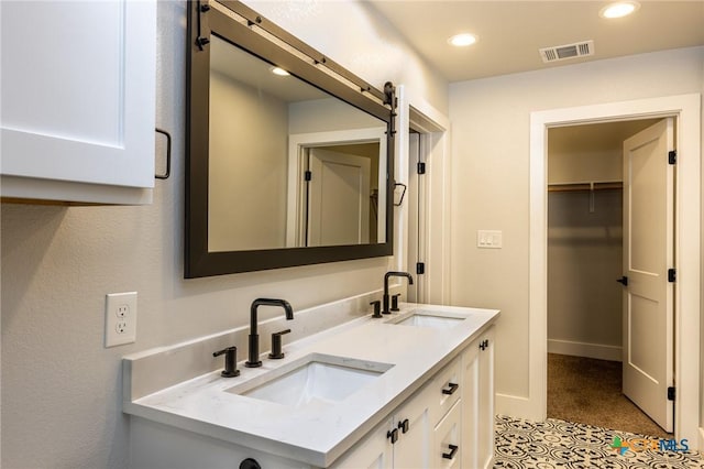 bathroom featuring vanity and tile patterned floors