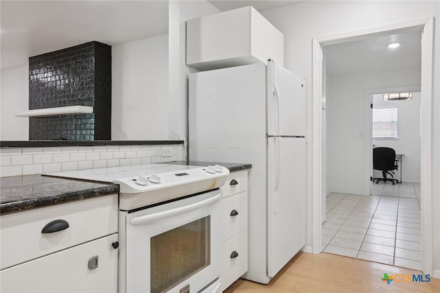 1334 Carnation Ln, New Braunfels, TX 78130 - kitchen featuring white appliances, white cabinets, light wood-type flooring, and a desk