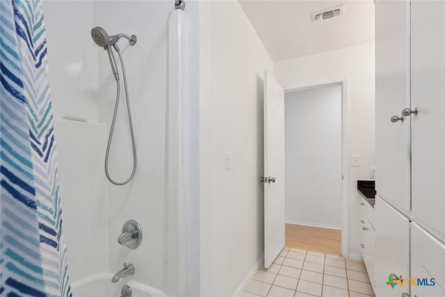 1334 Carnation Ln, New Braunfels, TX 78130 - full bathroom with tile patterned flooring, shower / bath combo with shower curtain, and vanity