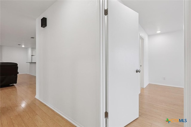 1334 Carnation Ln, New Braunfels, TX 78130 - hallway with light wood finished floors and recessed lighting